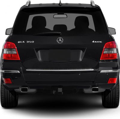 Rear view of a black SUV with dual exhausts and 4MATIC badge