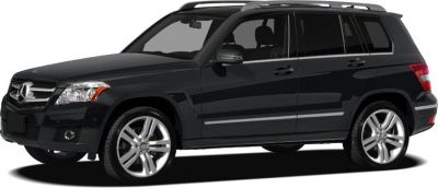 Black compact SUV with five-spoke alloy wheels and roof rails
