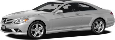 Silver two-door coupe with sporty alloy wheels and aerodynamic design