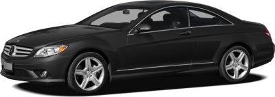 Sleek black coupe with side profile and alloy wheels
