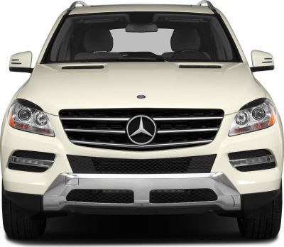 Front view with prominent grille and headlights