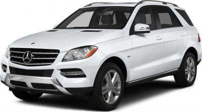 White SUV front side view with distinctive grille and headlights