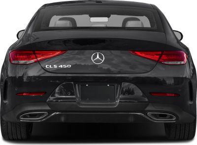Rear view showing tail lights and dual exhaust of a luxury coupe