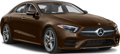 Front-side view of a sleek luxury coupe with distinctive grille and LED headlights