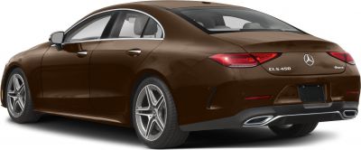 Rear view of a luxury coupe with sleek taillights and dual exhausts.
