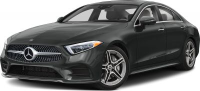 Front side view of sleek luxury coupe with diamond grille and alloy wheels