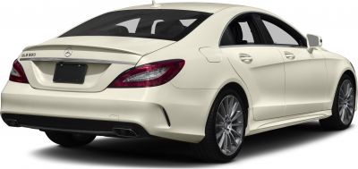 Rear and side of a luxury coupe with distinctive taillights and dual exhaust
