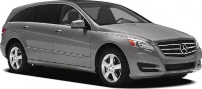 Front side view of luxury large MPV with alloy wheels and chrome grille