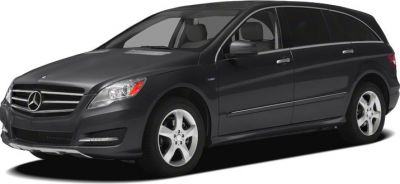 Black long wheelbase multi-purpose vehicle with luxury features and LED daytime running lights.