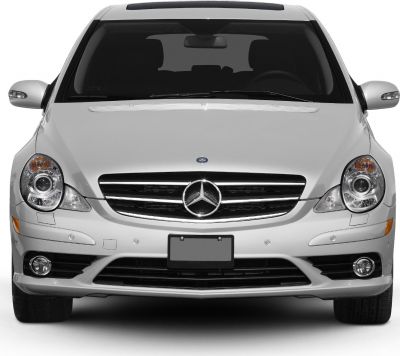 Front-facing view with headlights, grille, and fog lights