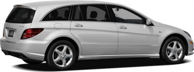 Luxury extended station wagon side profile with alloy wheels and rear spoiler