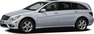 Side profile of an elongated luxury MPV with alloy wheels and smooth contours