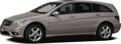 Sleek multi-door extended body vehicle with distinct front grille and alloy wheels