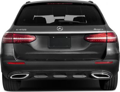 Rear view showing tail lights, dual exhaust, E 450 and 4MATIC badges.