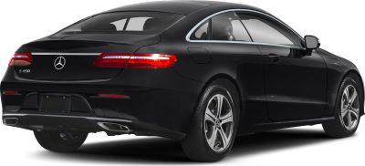Rear view of a black luxury coupe with distinct tail lights and dual exhausts