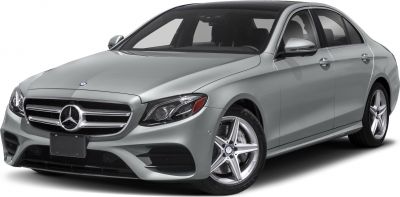 Front view showcasing grille, headlights, and alloy wheels.