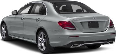 Rear view of a modern sedan with LED taillights and dual exhausts