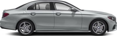 Side profile of silver luxury sedan with five-spoke alloy wheels.