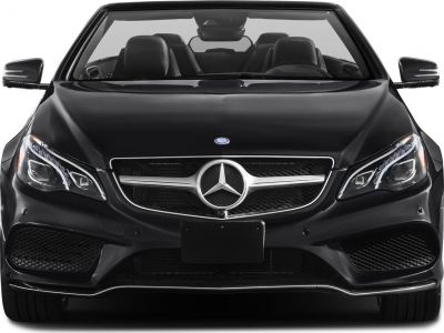 Front grille and headlights of a black convertible luxury vehicle
