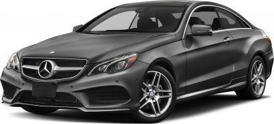 Front three-quarter view of sporty coupe with prominent headlights and alloy wheels