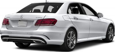 Rear view of luxury sedan with distinctive taillights and dual exhausts