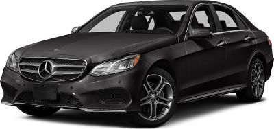 Front side profile showcasing grille and alloy wheels