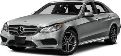 Silver luxury sedan with modern grille, headlights, and alloy wheels