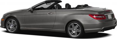 Side profile of a sleek convertible with alloy wheels and open-top design