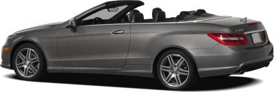 Side profile of a sleek gray convertible with alloy wheels and open roof