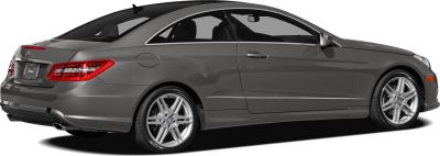 Side and rear profile of sleek luxury coupe with alloy wheels