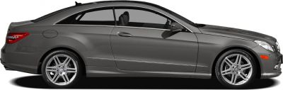Side profile of a two-door coupe with alloy wheels and sleek body lines