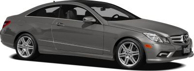 Front side view of a sleek coupe with alloy wheels