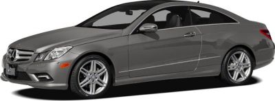 Front side view of a gray two-door coupe with alloy wheels