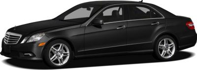 Black 2010 sedan side profile with alloy wheels