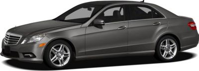Grey luxury sedan with sleek headlights and alloy wheels