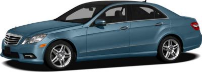 Side profile of a blue luxury sedan with alloy wheels