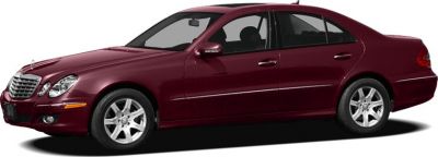 Side profile of burgundy sedan with alloy wheels