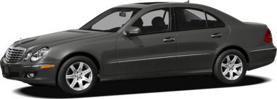 Four-door sedan side view with front grille and alloy wheels