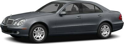 Side profile and front view of a luxury sedan with distinctive headlights and alloy wheels