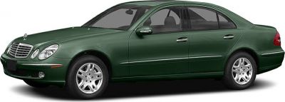 Green luxury sedan side profile with alloy wheels and classic body shape