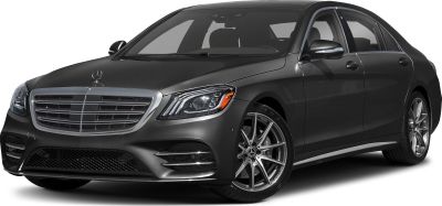 Luxury sedan front view with LED headlights and stylish alloy wheels