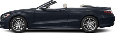 Side profile of a sleek convertible with open roof and alloy wheels.