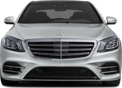 Luxury sedan front with distinctive grille and LED headlights
