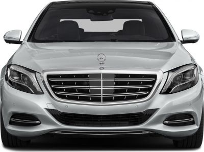 Front view of luxury sedan grille and headlights