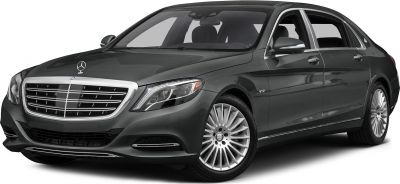 Luxury sedan front with V12 badge, LED headlights, and multi-spoke wheels