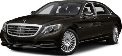 Luxury sedan front side view with chrome grille and V12 badge