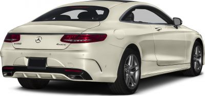 Rear and side view of a luxury coupe with sleek taillights and dual exhaust