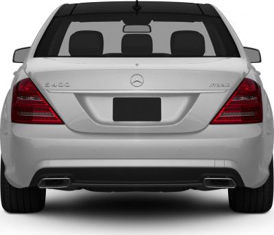 Rear view showcasing taillights and dual exhaust of hybrid luxury sedan