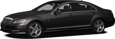 Luxury black sedan with chrome accents and five-spoke alloy wheels