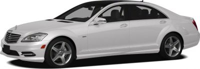 Side and front view of luxury white sedan with alloy wheels
